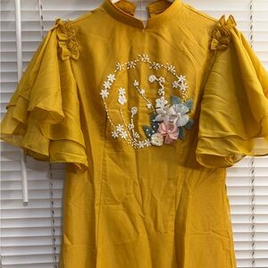 Ao Dai for Tet
No pant  
Try on only, never worn